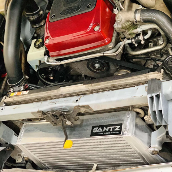 ANTZ-FGXSTI $1290 Stage 2 Intercooler FPV FG XR6 Turbo F6 FORD FALCON FG FGX $1290 Aftermarket intercooler piping is required for use with this intercooler as factory piping will not fit Dimensions of bar & plate core: 410 x 400 x 90mm. Tig welded construction Raw aluminium finish 2.5″ (64mm) inlet and outlet. Proven to effectively reduce air temperatures for a high performance application. Utilises factory intercooler mounting points for an easy installation and fitment (Fitting guide provided on our fitt