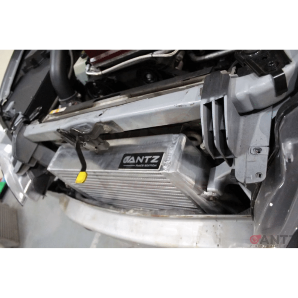 ANTZ-FGXSTI $1290 Stage 2 Intercooler FPV FG XR6 Turbo F6 FORD FALCON FG FGX $1290 Aftermarket intercooler piping is required for use with this intercooler as factory piping will not fit Dimensions of bar & plate core: 410 x 400 x 90mm. Tig welded construction Raw aluminium finish 2.5″ (64mm) inlet and outlet. Proven to effectively reduce air temperatures for a high performance application. Utilises factory intercooler mounting points for an easy installation and fitment (Fitting guide provided on our fitt