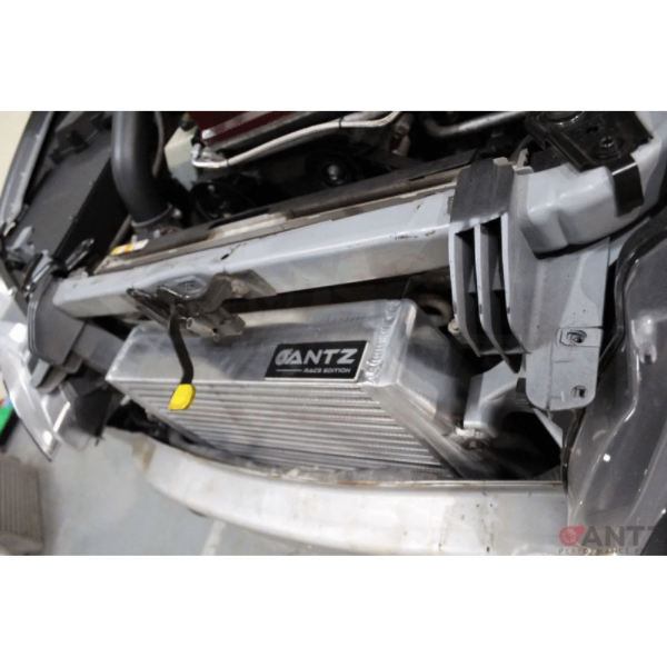 ANTZ-FGXSTI $1290 Stage 2 Intercooler FPV FG XR6 Turbo F6 FORD FALCON FG FGX $1290  Aftermarket intercooler piping is required for use with this intercooler as factory piping will not fit Dimensions of bar & plate core: 410 x 400 x 90mm. Tig welded construction Raw aluminium finish 2.5″ (64mm) inlet and outlet. Proven to effectively reduce air temperatures for a high performance application. Utilises factory intercooler mounting points for an easy installation and fitment (Fitting guide provided on our fitt